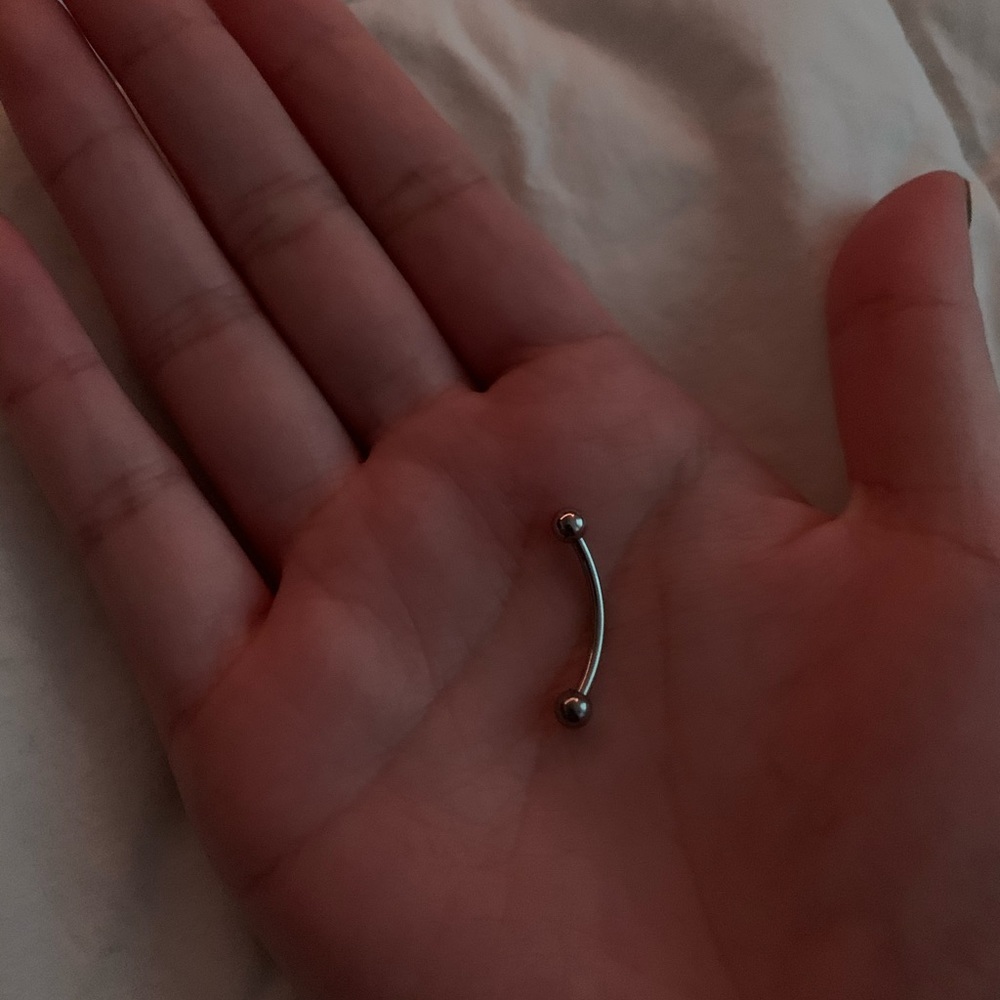 Silver belly button ring